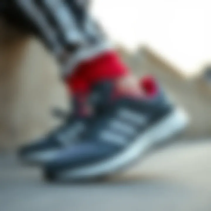 Fashionable Adidas shoes paired with sporty outfit