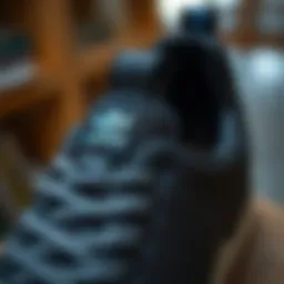 Close-up of Adidas shoe with visible stitching and logo