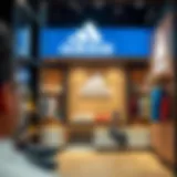 Interior view of an adidas store showcasing various product displays