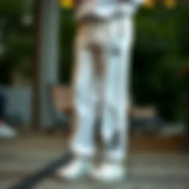 Elegant design of Adidas white sweatpants showcasing the brand's signature style.