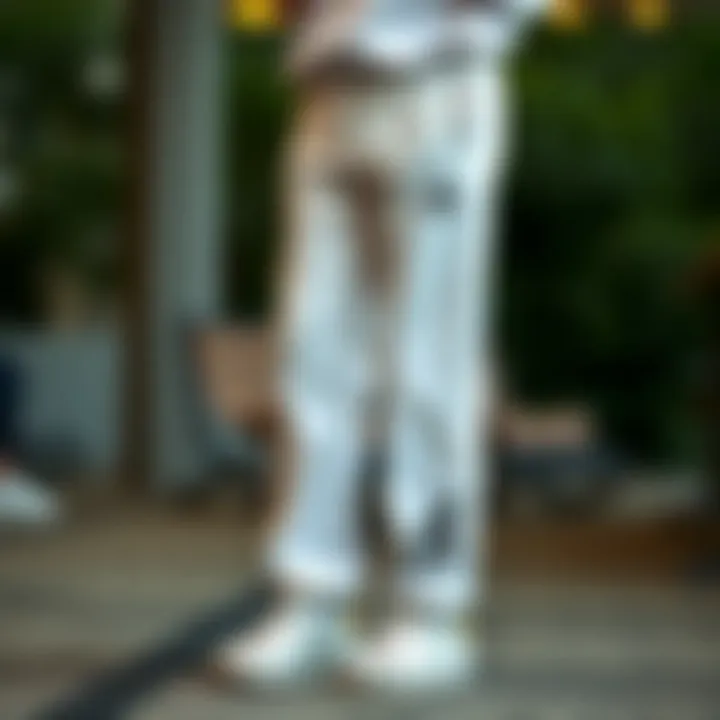 Elegant design of Adidas white sweatpants showcasing the brand's signature style.