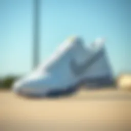 Elegant white Nike sports shoes showcasing unique design features.