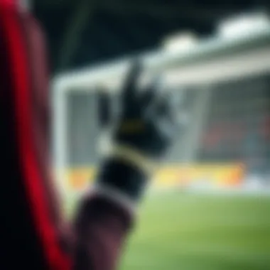 A goalkeeper demonstrating proper glove fit and usage