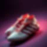 A stylish pair of Galatasaray football boots displayed on a vibrant background