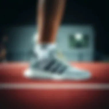 Athlete wearing Adidas sneakers for performance