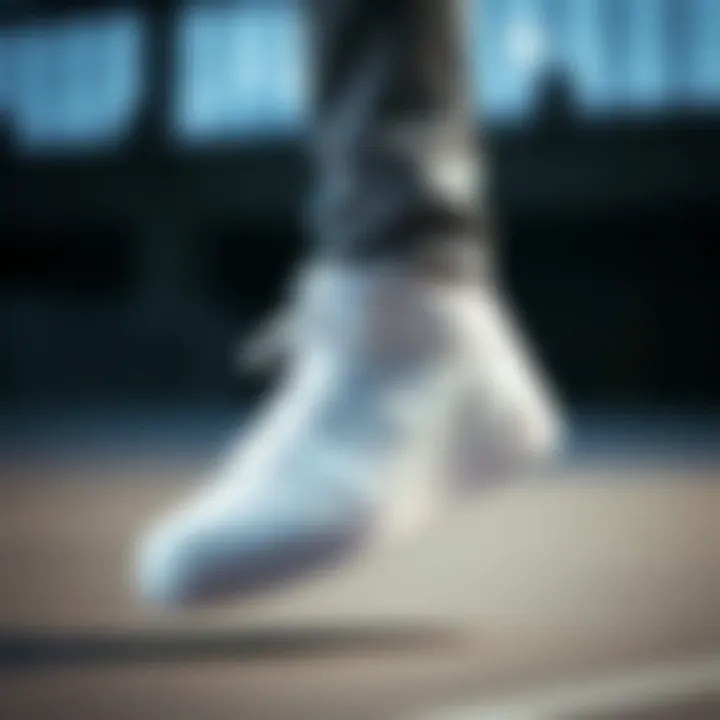 Dynamic action shot demonstrating the performance features of Nike Jordan white sneaker