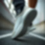 Dynamic perspective of Puma Rebound Joy Beyaz showcasing its sleek design