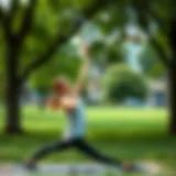 Couple performing a yoga pose together in a park