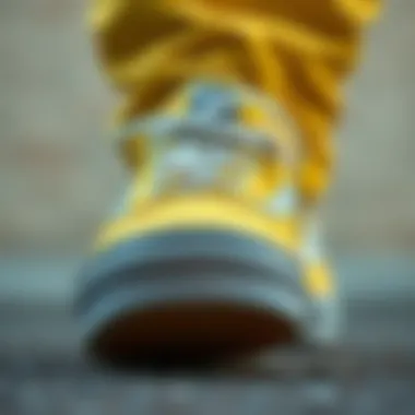 Design Details of Vans Yellow Footwear Close-up of Vans yellow footwear showcasing design details